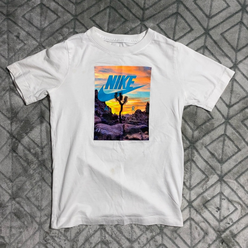 (2) Nike shirts